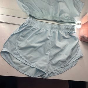 light blue nike women’s running shorts